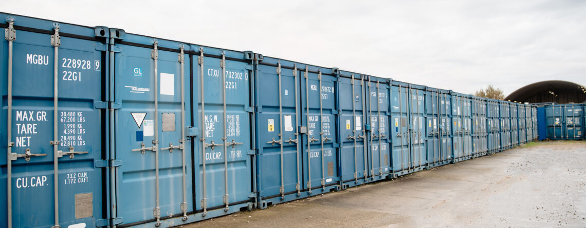 Long row of blue container storage units at Store For You